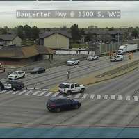 Driver runs red light, crashes on Bangerter and runs, police say