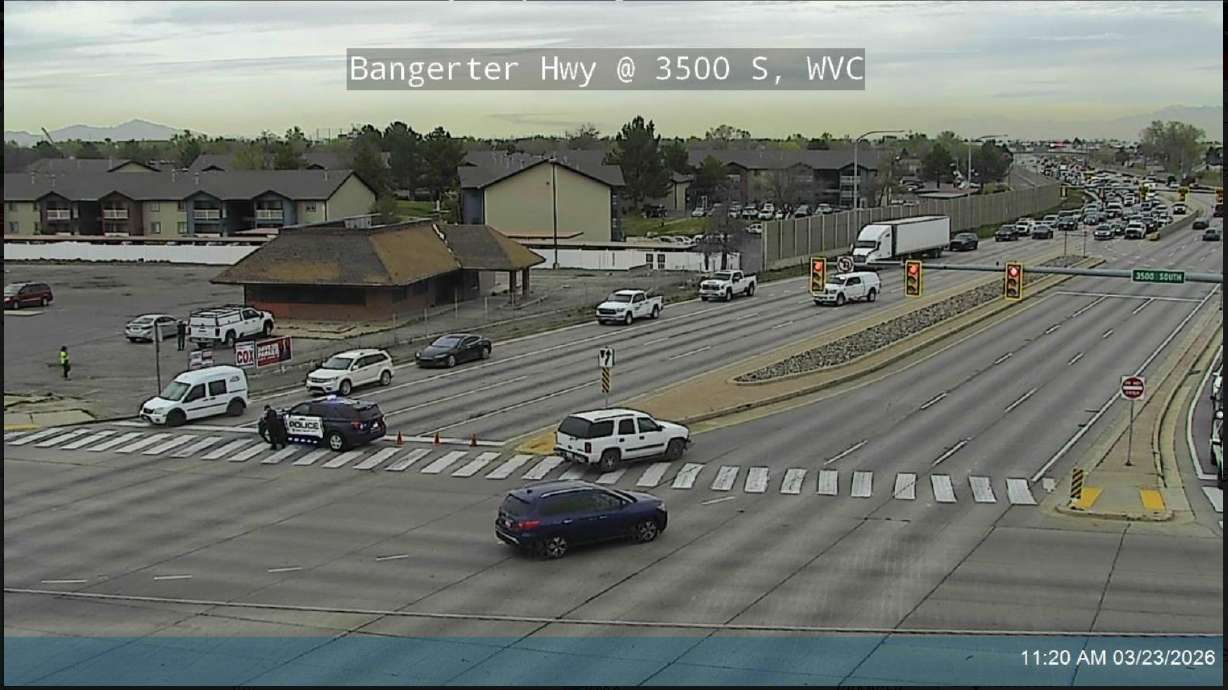 Bangerter Highway was briefly closed at 3500 South in West Valley City due to a crash. One man was arrested and one officer suffered injuries while arresting him, police say.