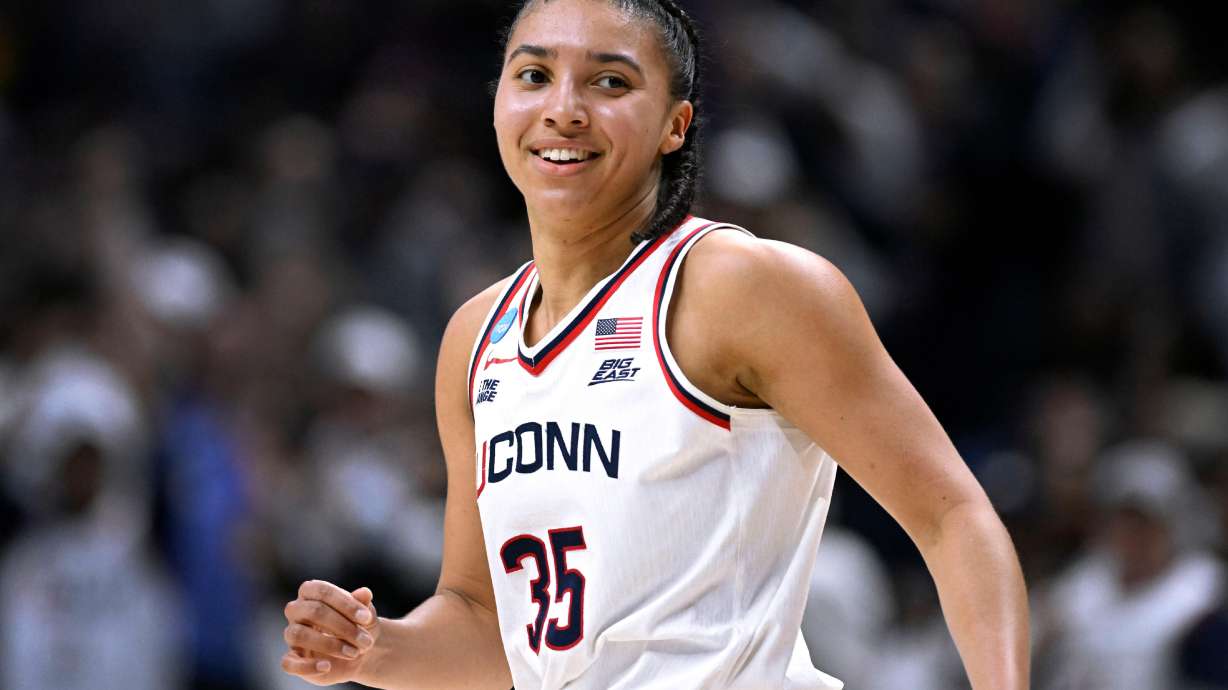 UConn guard Azzi Fudd (35) reacts after making another 3-point basket during the first half in the second round of the NCAA college basketball tournament against Syracuse, Monday, March 23, 2026, in Storrs, Conn.