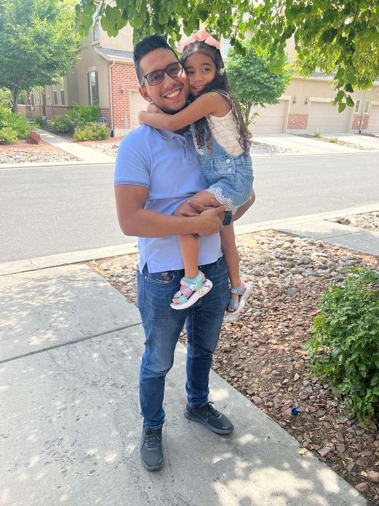 Leandro Bermudez and his daughter Lucia, 7, are stuck in Colombia, where they traveled to fix the girl's migratory status, after U.S. officials denied her visa request. They're pictured in Murray in January 2026.