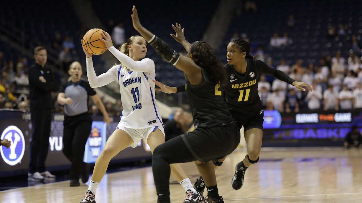 BYU guard Delaney Gibb is doubled team during a WBIT women's basketball postseason game against Missouri, Monday, March 23, 2026 at the Marriott Center in Provo, Utah.