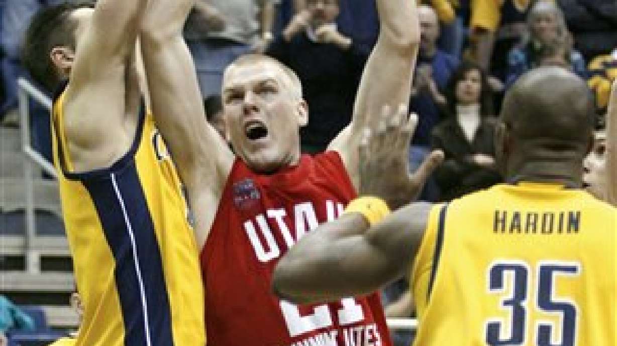Green hits winning shot as Utah beats California 67-65