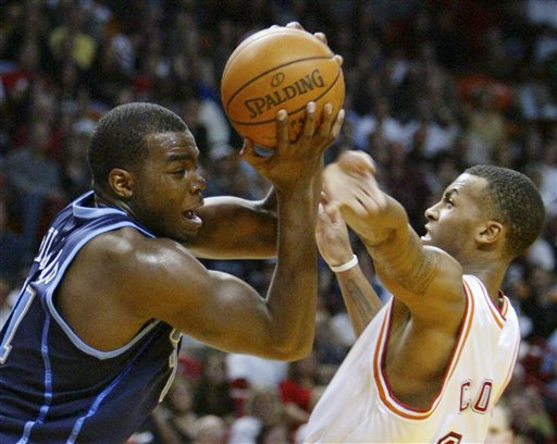 Wade hits at the buzzer, lifting Miami past Utah 104-102