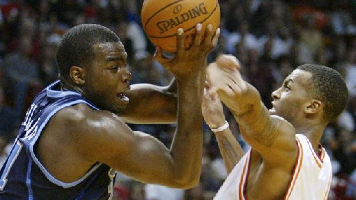 Wade hits at the buzzer, lifting Miami past Utah 104-102