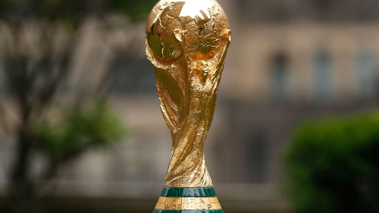 FILE - The FIFA World Cup Trophy is displayed before press conference at Rockefeller Plaza, June 16, 2022, in New York.