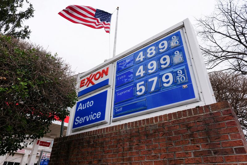 A board displays gas prices amid the ongoing U.S.-Israeli conflict with Iran,  in Washington, March 15. The war has caused gas and energy prices to soar worldwide.