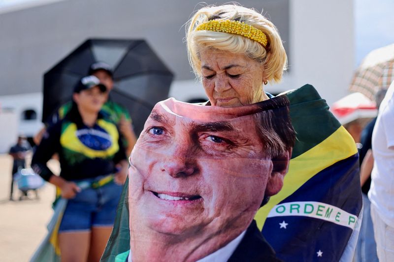 Brazil court places Bolsonaro under house arrest on health grounds