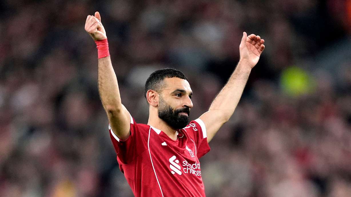 Liverpool's Mohamed Salah celebrates scoring his side's fourth goal during the second leg of the Champions League round of 16 soccer match between Liverpool and Galatasaray, in Liverpool, England, Wednesday, March 18, 2026.