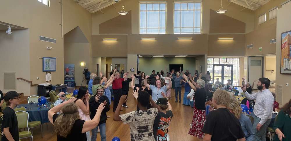 Granite School District students organize masquerade prom for Magna senior center members