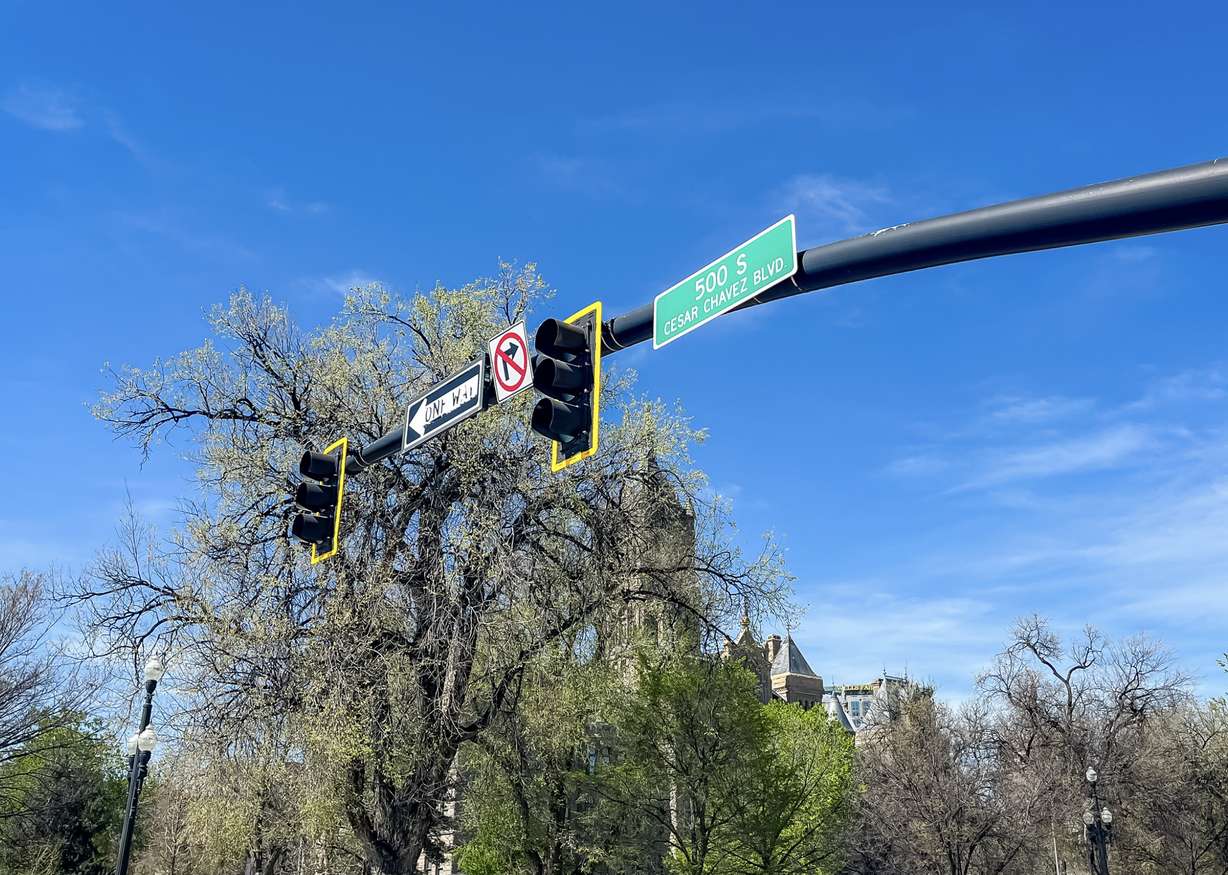 A sign displaying Cesar Chavez Boulevard is pictured near the Salt Lake City-County Building on Tuesday. The City Council honorarily named the road after him in 2002.