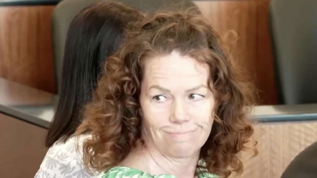 Meggan Sundwall smiles at someone behind her shortly before her verdict is read on Tuesday. She was found guilty of manslaughter but not aggravated murder as charged.