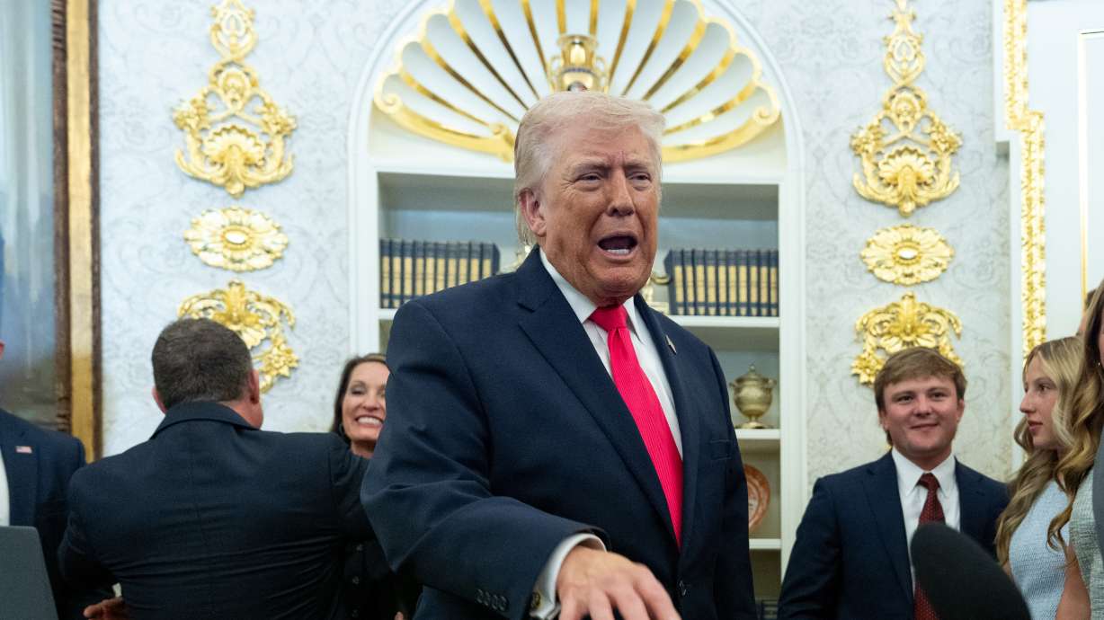 President Donald Trump speaks with reporters during the swearing-in ceremony for Homeland Security Secretary Markwayne Mullin in the Oval Office of the White House, Tuesday, in Washington. Democrat Emily Gregory won a Florida special election on Tuesday.