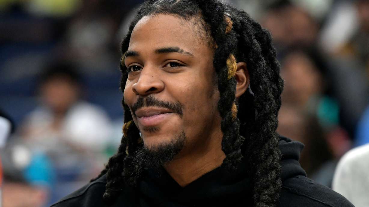 Memphis Grizzlies guard Ja Morant looks on from the bench in the first half of an NBA basketball game against the Portland Trail Blazers, Wednesday, March 4, 2026, in Memphis, Tenn.