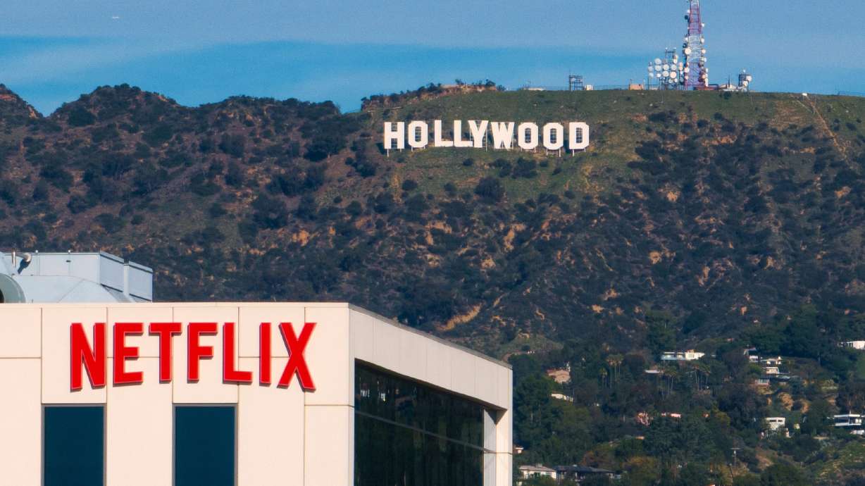 FILE - A Netflix sign is displayed atop a building in Los Angeles, on Dec. 18, 2025.