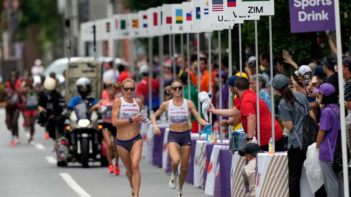 FILE - United States' Susanna Sullivan, left, and United States' Jessica McClain race in the women's marathon at the World Athletics Championships in Tokyo, Sept. 14, 2025.