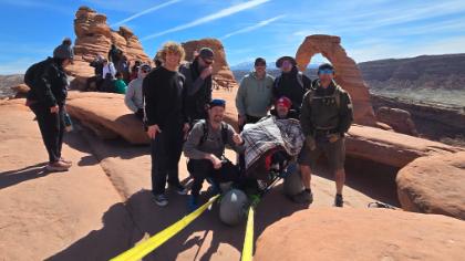 Man living with ALS carried to Delicate Arch in emotional birthday trek