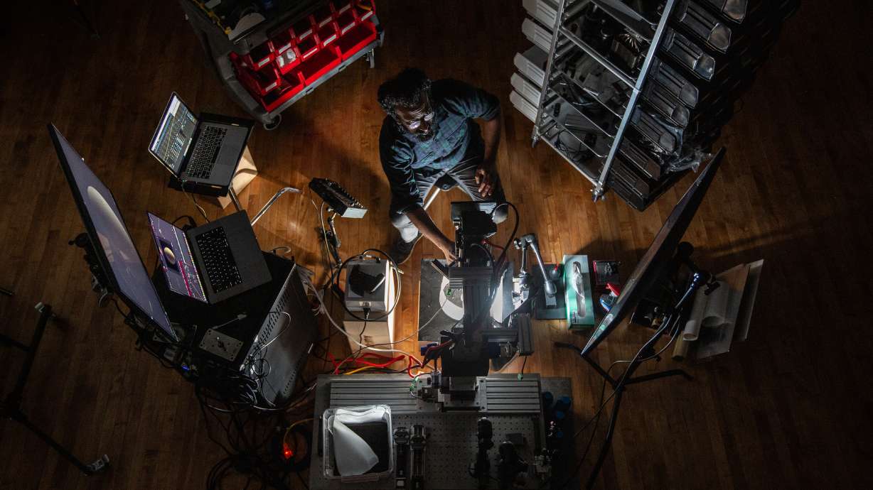 Anand Varma at work in his science/photo lab.