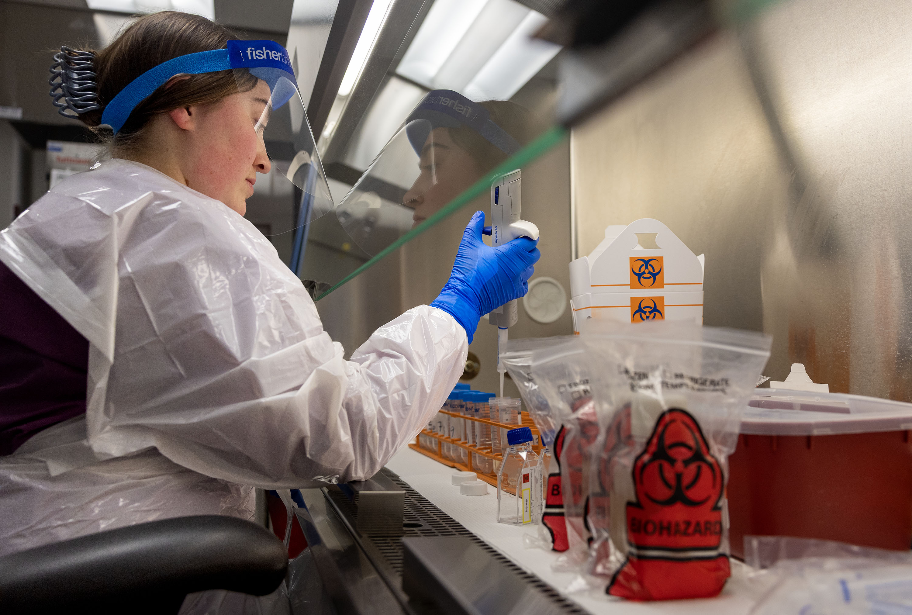 Bailee Troutman, microbiologist, demonstrates how to process wastewater at the Utah Public Health Lab in Taylorsville on March 19. Measles is currently found in wastewater throughout most of Utah.