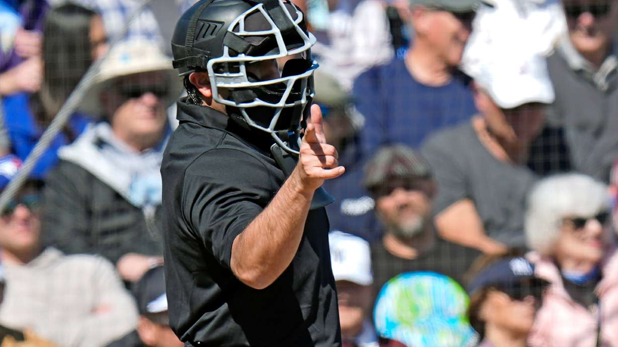 FILE 0 Home plate umpire Tom Fornarola calls a strike during the fifth inning of a spring training baseball game between the Toronto Blue Jays and the New York Yankees Tuesday, Feb. 24, 2026, in Dunedin, Fla.