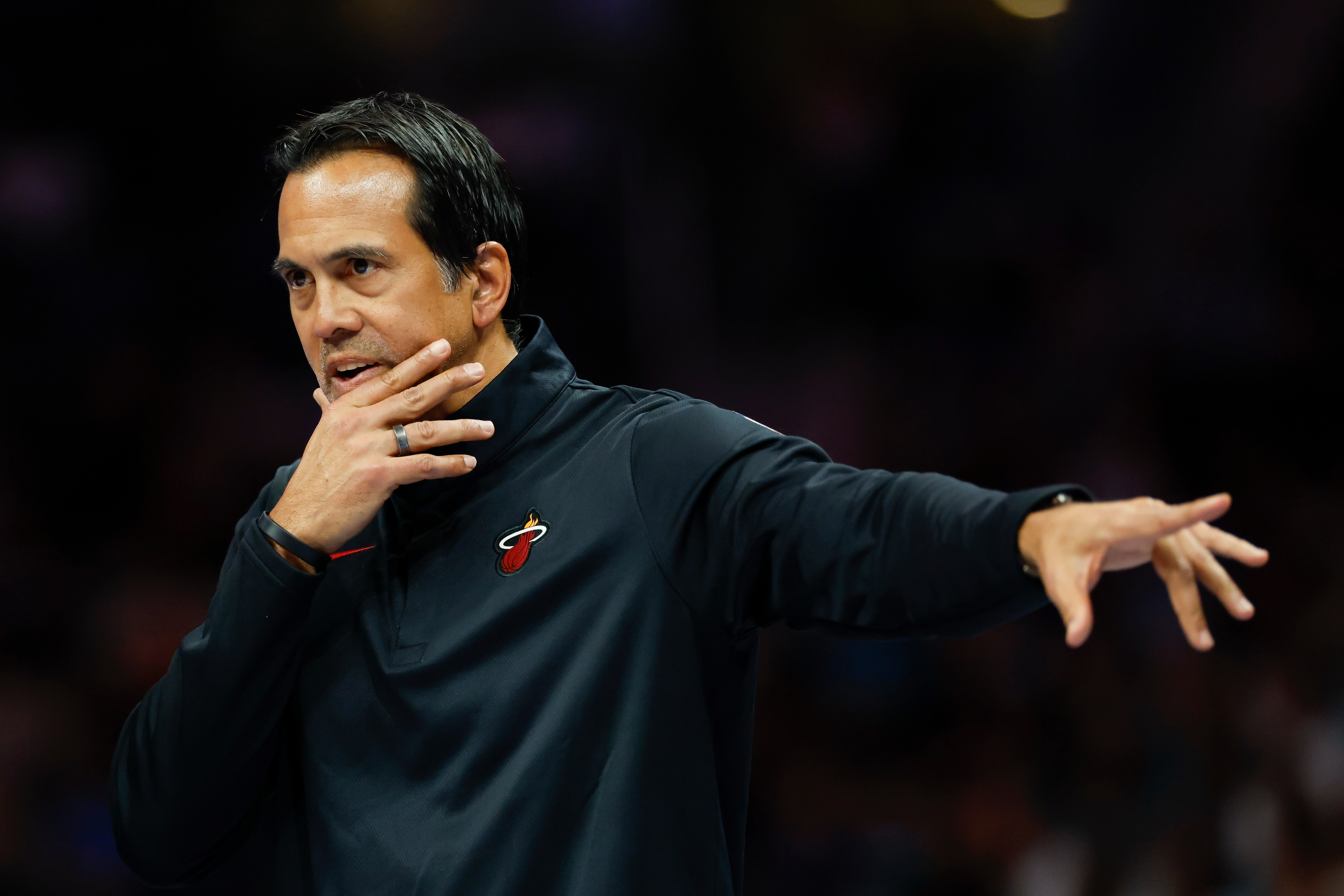 Miami Heat head coach Erik Spoelstra directs his team during the first half of an NBA basketball game against the Charlotte Hornets in Charlotte, N.C., Friday, March 6, 2026. 