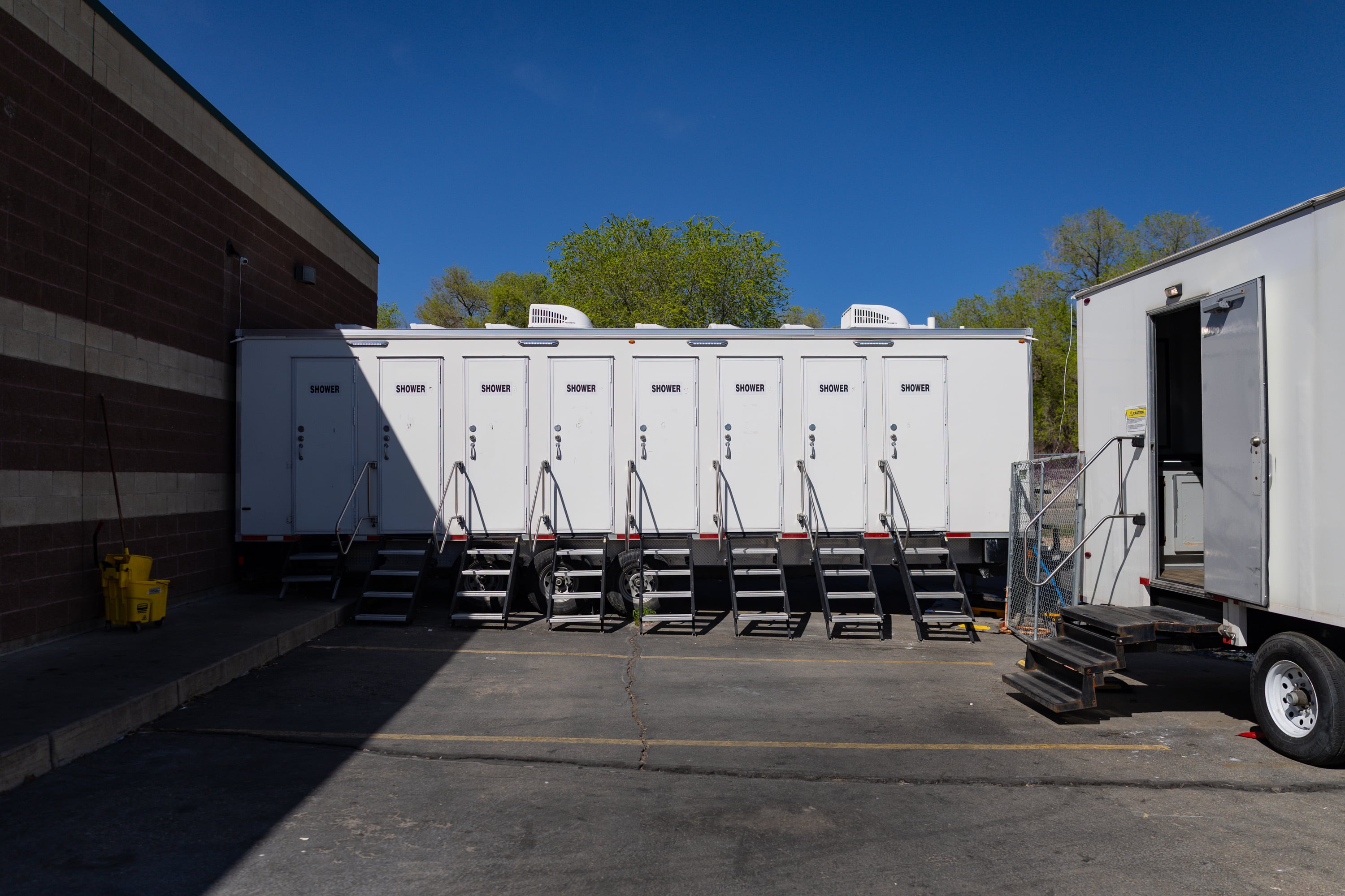 Outdoor showers and outdoor bathrooms at Switchpoint's Salt Lake Overflow Shelter in West Valley City on Wednesday.