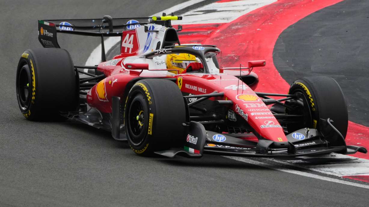 Ferrari driver Lewis Hamilton of Britain steers his car during the Chinese Formula One Grand Prix race at the Shanghai International Circuit, in Shanghai, China, Sunday, March 15, 2026.