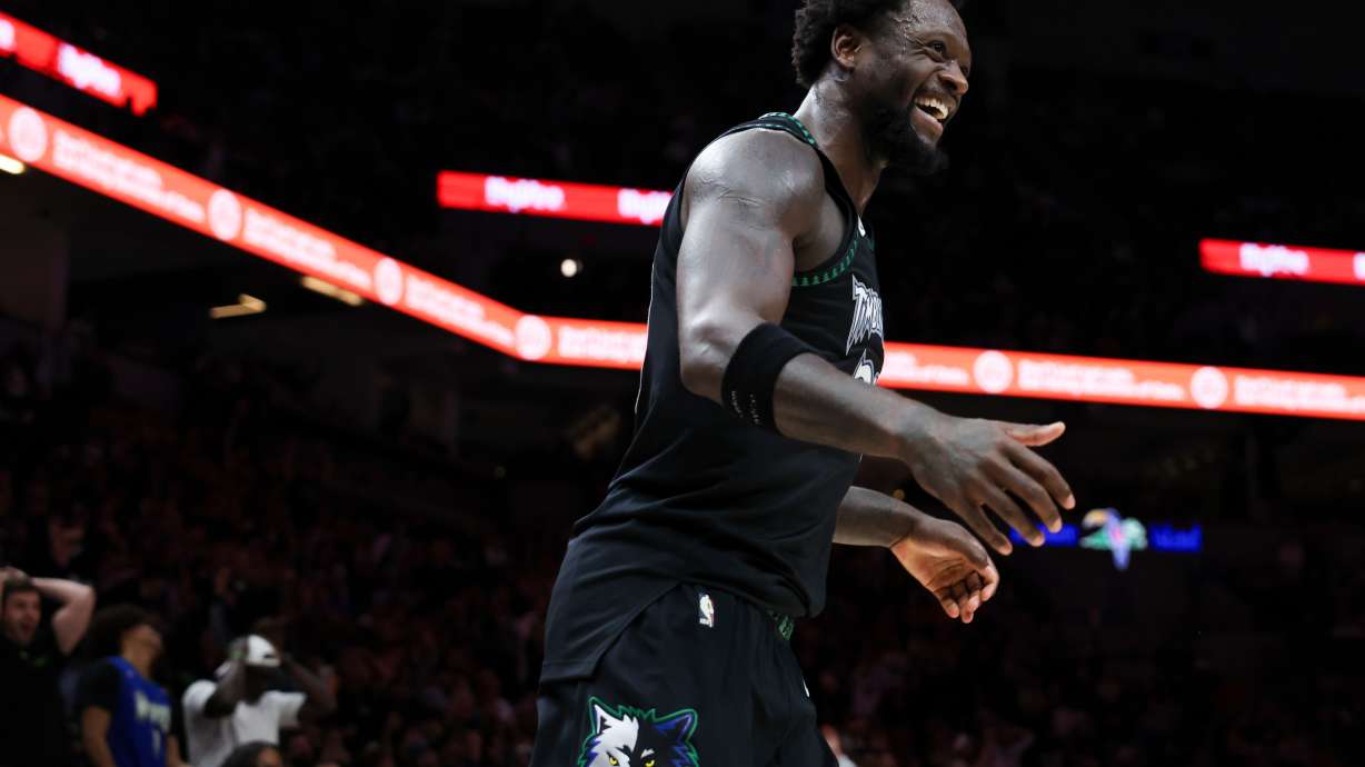 Minnesota Timberwolves forward Julius Randle reacts during the second half of an NBA basketball game against the Houston Rockets, Wednesday, March 25, 2026, in Minneapolis.