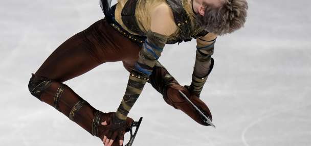 Malinin rebounds from Olympics at the worlds with a personal-best short program