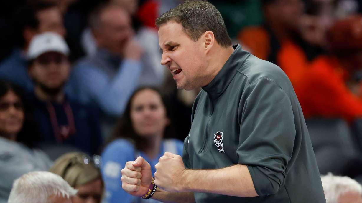 North Carolina State head coach Will Wade reacts during the second half of an NCAA college basketball game against Virginia in the quarterfinals of the Atlantic Coast Conference tournament in Charlotte, N.C., Thursday, March 12, 2026.
