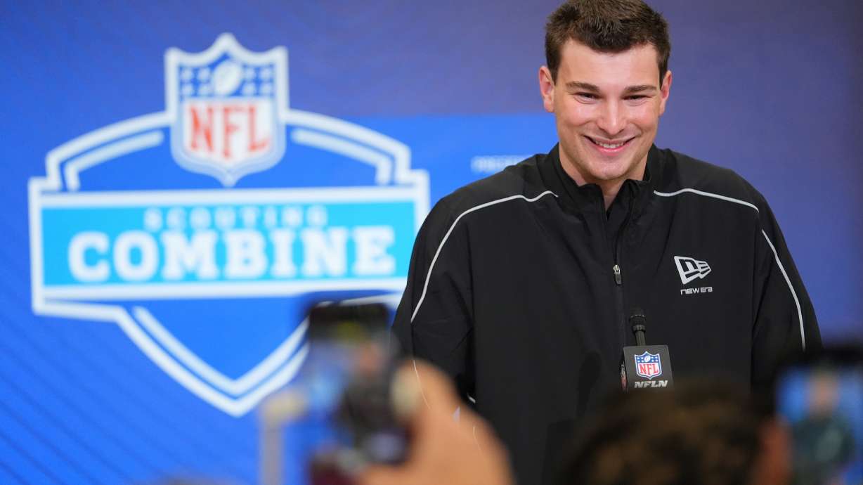 FILE - Indiana quarterback Fernando Mendoza (11) speaks during a news conference at the NFL football scouting combine in Indianapolis, Feb. 27, 2026.