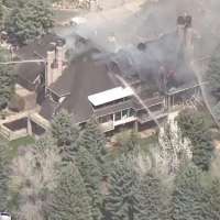 Fire crews respond to large house fire outside Willow Creek Country Club