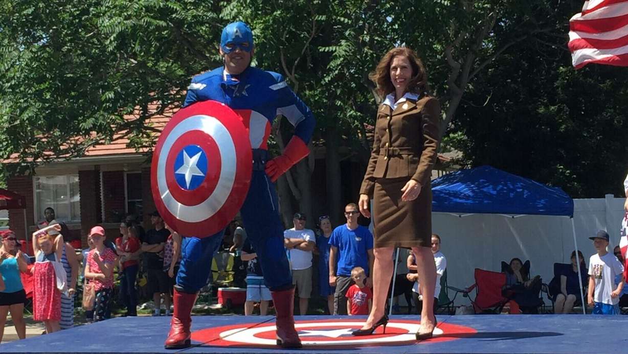Dr. Layne Kamalu at his “other” job, riding in the Kaysville parade each year as Captain America. Kamalu recently suffered a heart attack and took time on Wednesday to thank the first responders who saved his life.