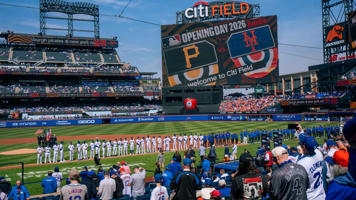 Players line up for introductions during an opening-day baseball game between the New York Mets and the Pittsburgh Pirates, Thursday, March 26, 2026, in New York.