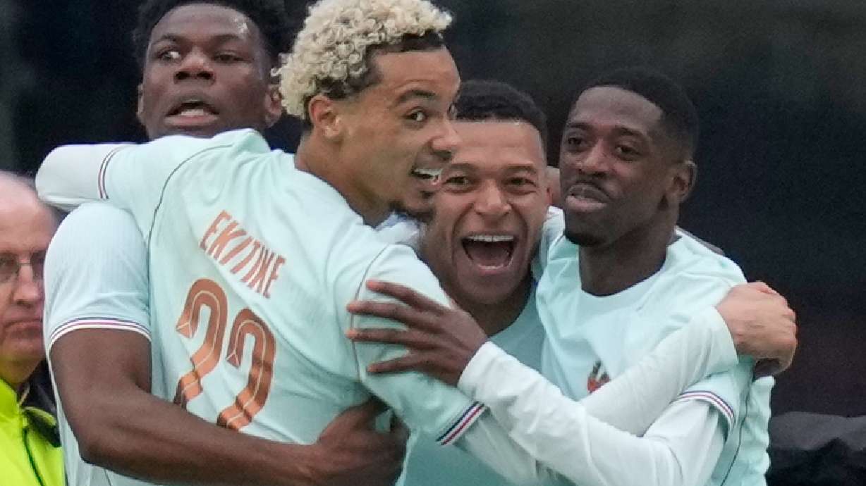 Kylian Mbappe of France, second right, celebrates after scoring the opening goal during the international friendly soccer match between Brazil and France in Foxborough, Mass, Thursday, March 26, 2026.