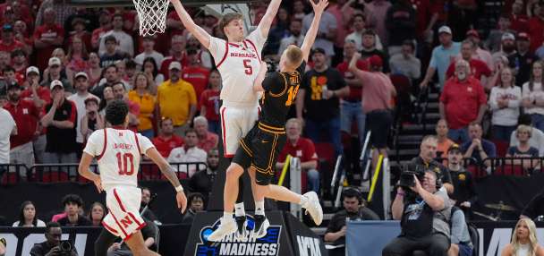 Ninth-seeded Iowa continues improbable March run, beating Nebraska 77-71 to reach Sweet 16