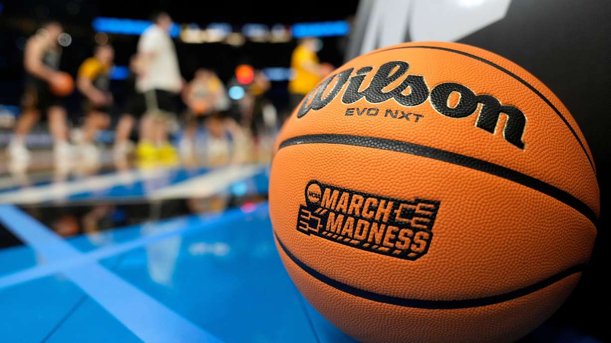 A March Madness basketball rests on the court as Iowa runs drills during practice at the NCAA college basketball tournament Thursday, March 19, 2026, in Tampa, Fla.