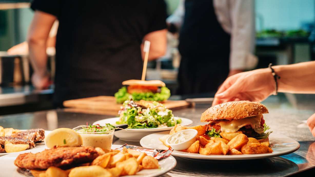 Food orders on the kitchen table in the restaurant