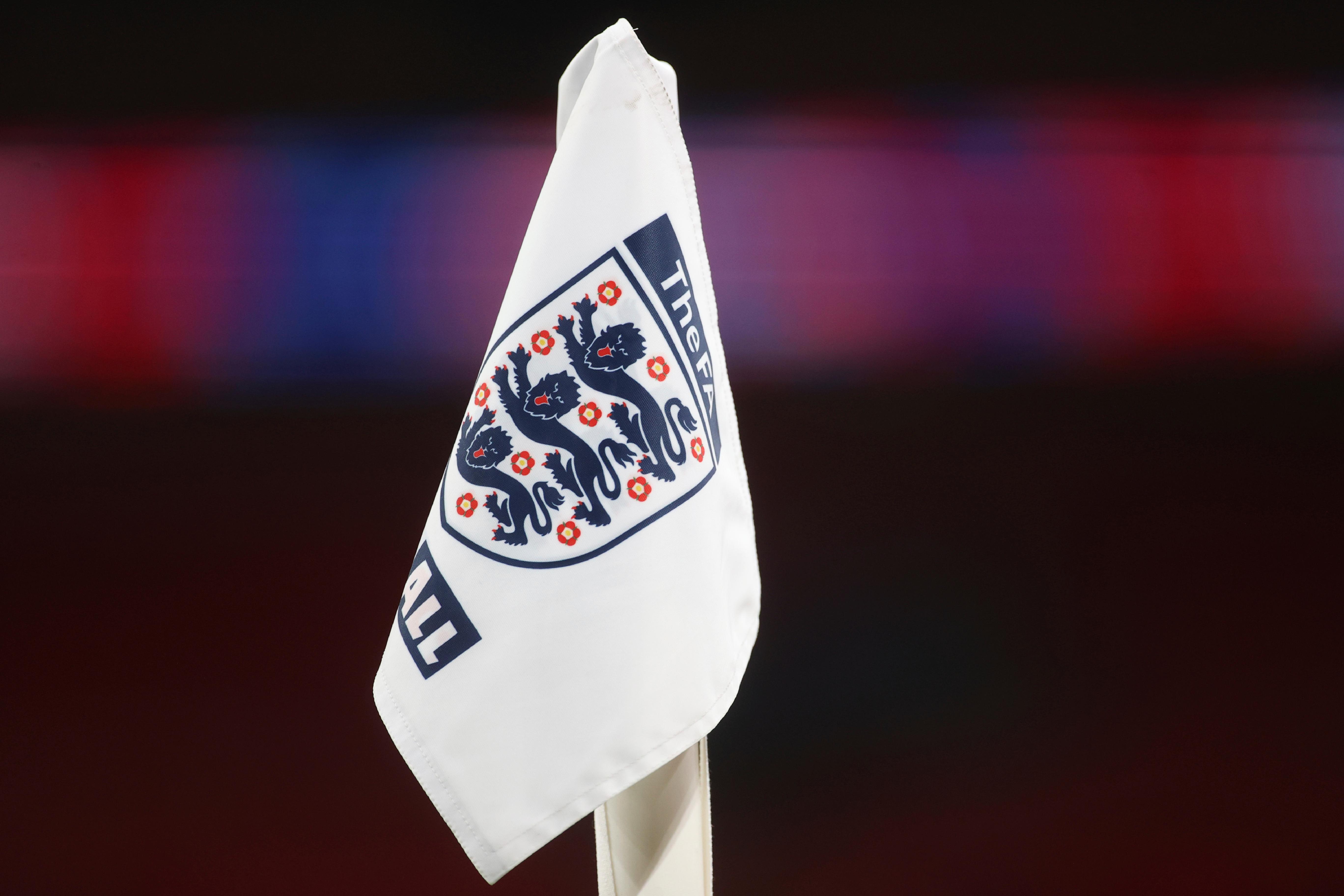 FILE - A corner flag with the England logo on it ahead of the World Cup 2022 group I qualifying soccer match between England and San Marino at Wembley stadium in London, Thursday March 25, 2021. 