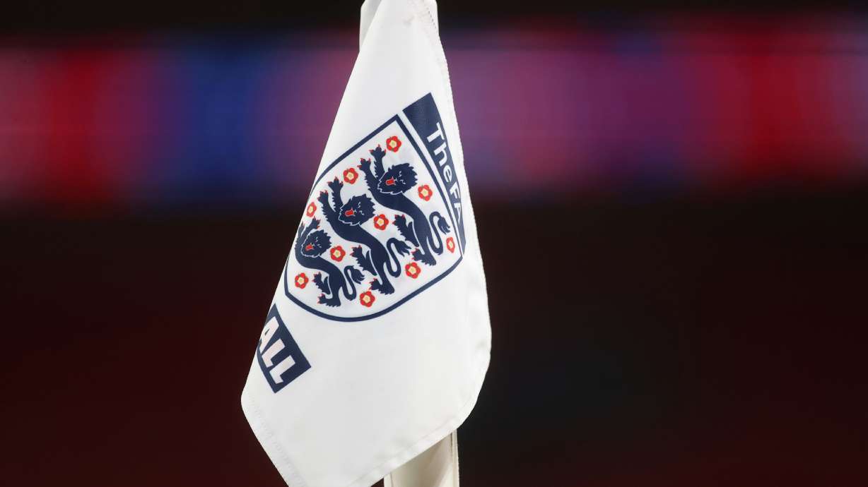 FILE - A corner flag with the England logo on it ahead of the World Cup 2022 group I qualifying soccer match between England and San Marino at Wembley stadium in London, Thursday March 25, 2021.