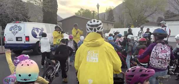 More than 150 kids join BYU's Cosmo to bike to school in Orem