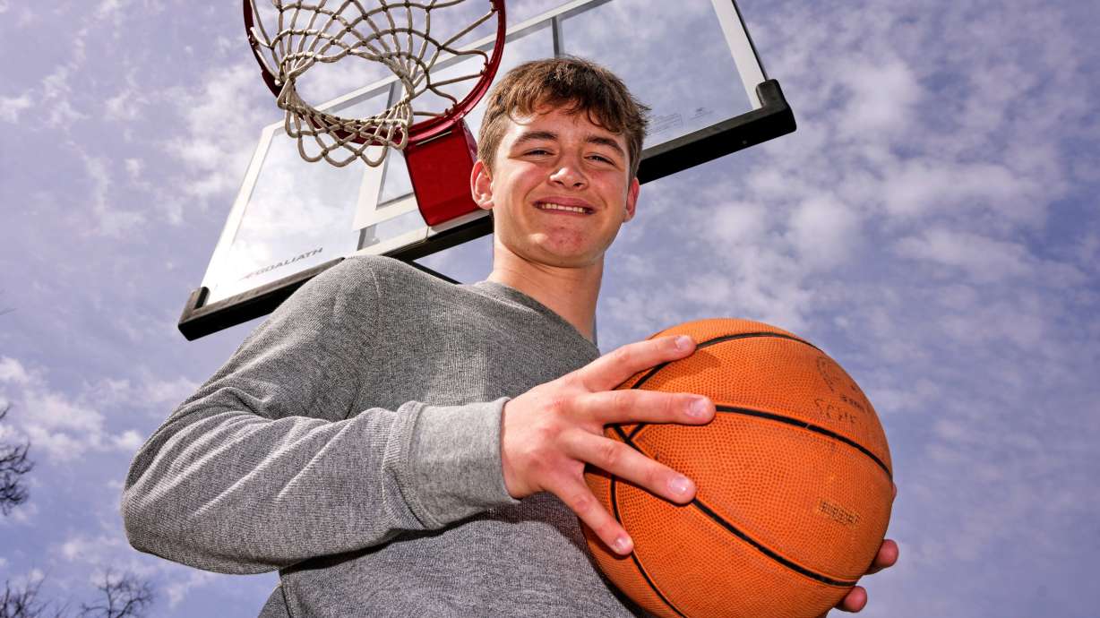 Otto Schellhamer, an eighth-grader who has the only perfect bracket after the opening weekend of the men’s and women’s NCAA college basketball tournaments, poses in his backyard in Plum Borough, Pa., Wednesday, March 25, 2026.