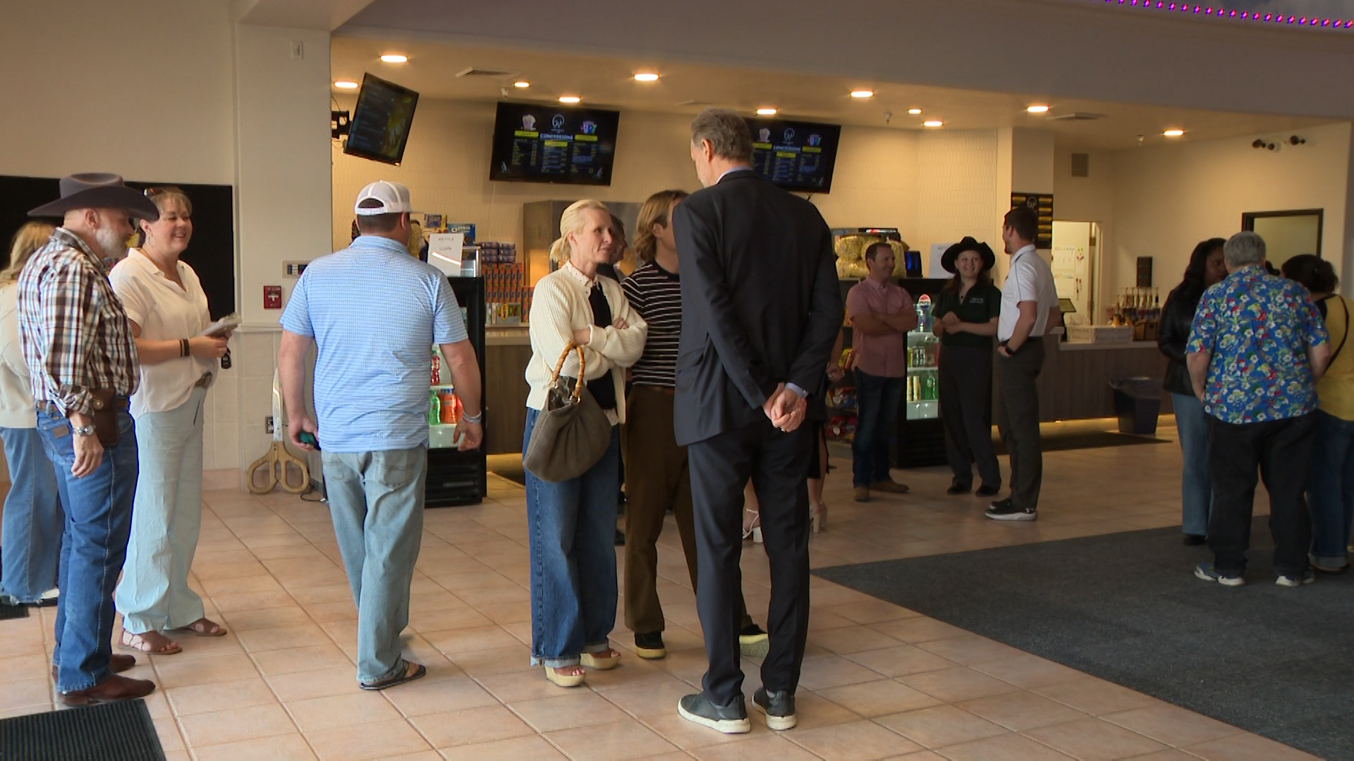 People gather at the grand reopening of Wayfarer Theaters in Payson on Friday. The theater is now owned by Illinois billionaire Steve Sarowitz.
