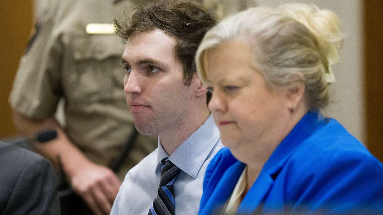 Tyler Robinson, accused in the fatal shooting of Charlie Kirk, sits beside defense attorney Kathryn Nester during a hearing in 4th District Court in Provo on Jan. 16.