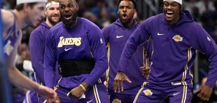 LeBron passes to Bronny for a 3-pointer and the NBA's first father-son assist, league says