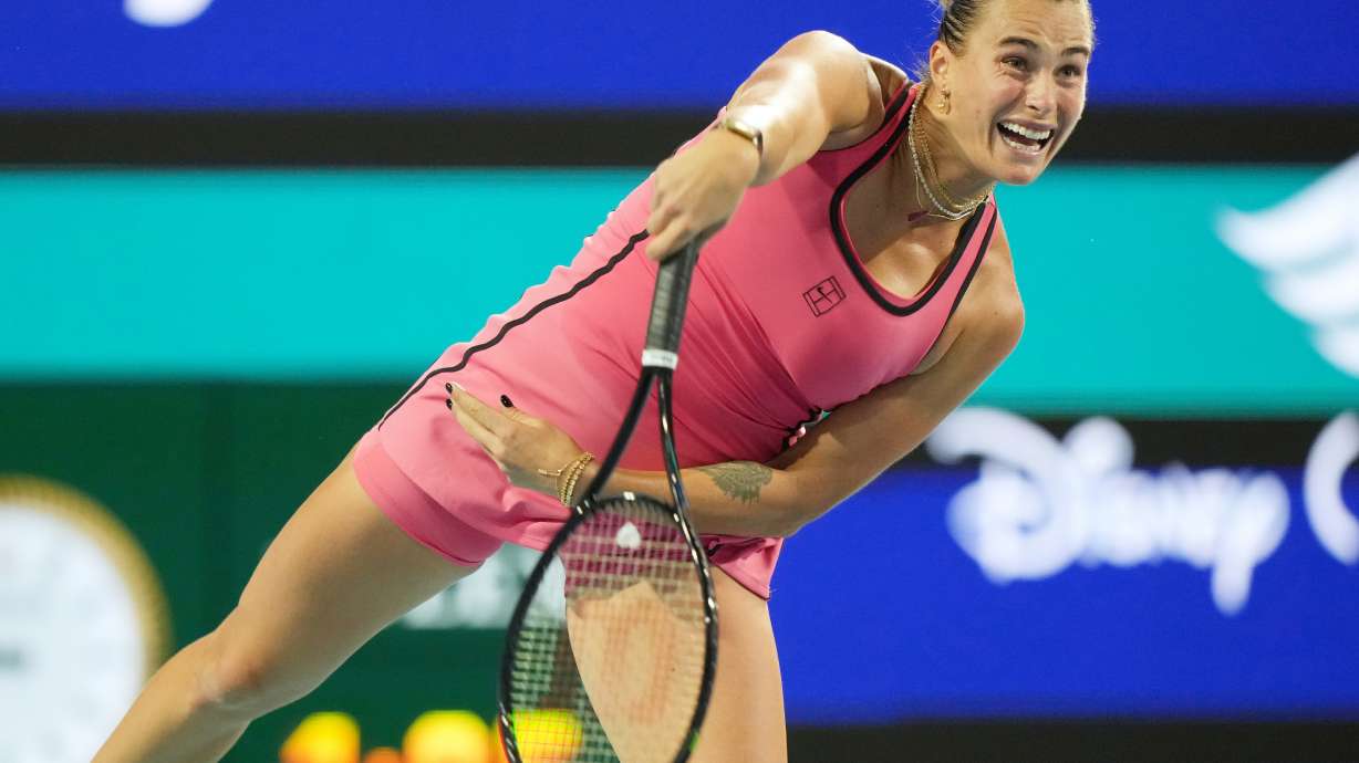 Aryna Sabalenka serves to Elena Rybakina of Kazakhstan during a semifinal match at the Miami Open tennis tournament, Thursday, March 26, 2026, in Miami Gardens, Fla.