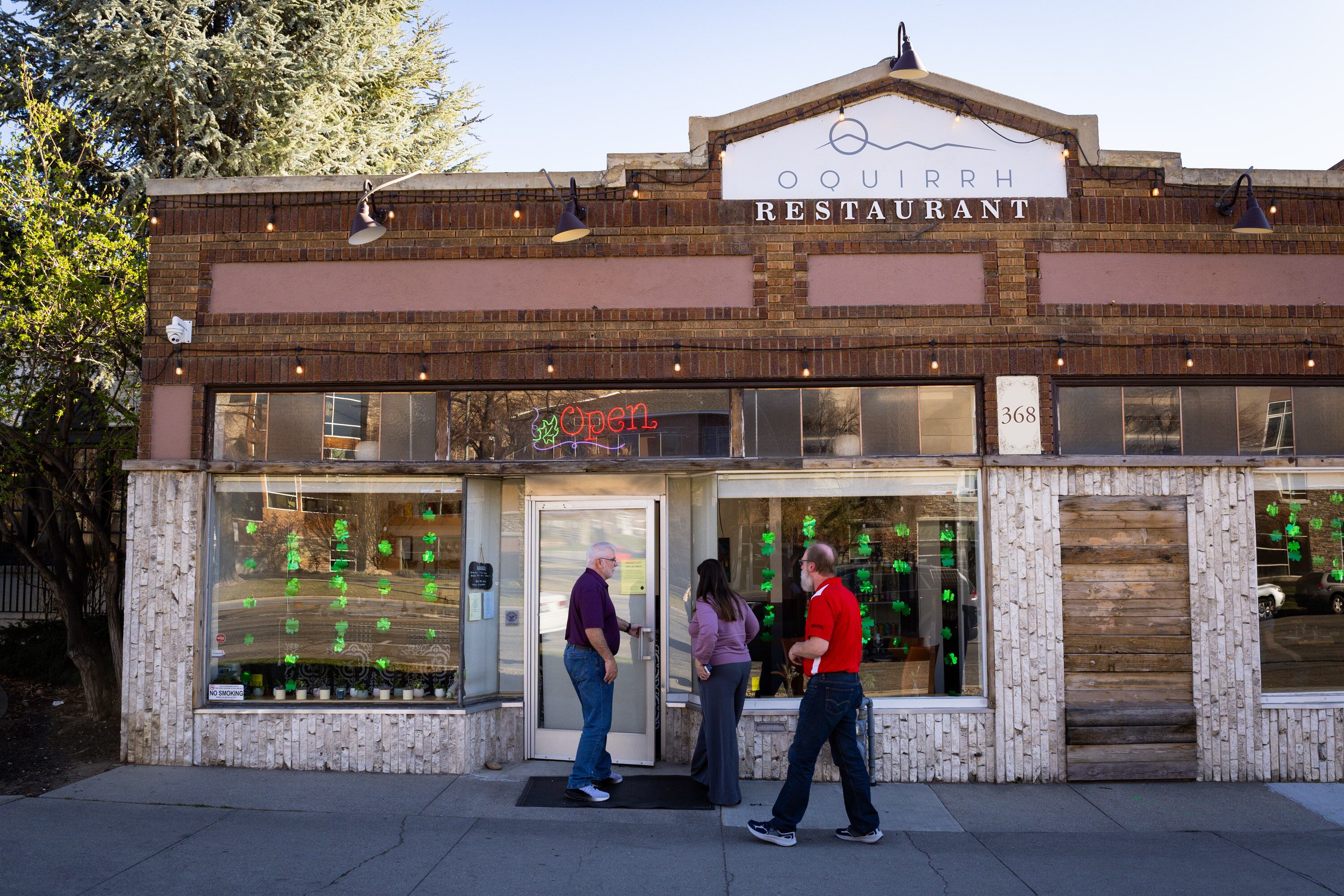 People enter Oquirrh Restaurant in Salt Lake City on March 19. The restaurant is owned by former pro snowboarder Andrew Fuller.