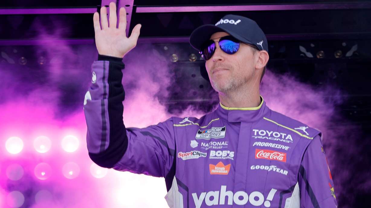 Denny Hamlin waves during driver introductions before a NASCAR Cup Series auto race at Las Vegas Motor Speedway Sunday, March 15, 2026, in Las Vegas.