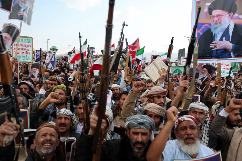 People attend at a protest against Israel and the U.S. strikes on Iran, following the killing of Ali Khamenei, in Sanaa, Yemen, March 1. The Yemen-based Houthis entered the Iran war with their first strikes against Israel on Saturday.