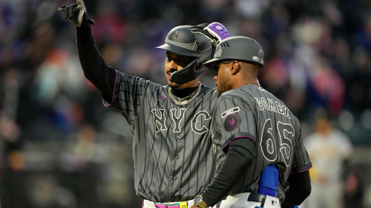 New York Mets third baseman Mark Vientos (27) celebrates after hitting a single during the tenth inning of a baseball game against the Pittsburgh Pirates, Saturday, March 28, 2026, in New York.