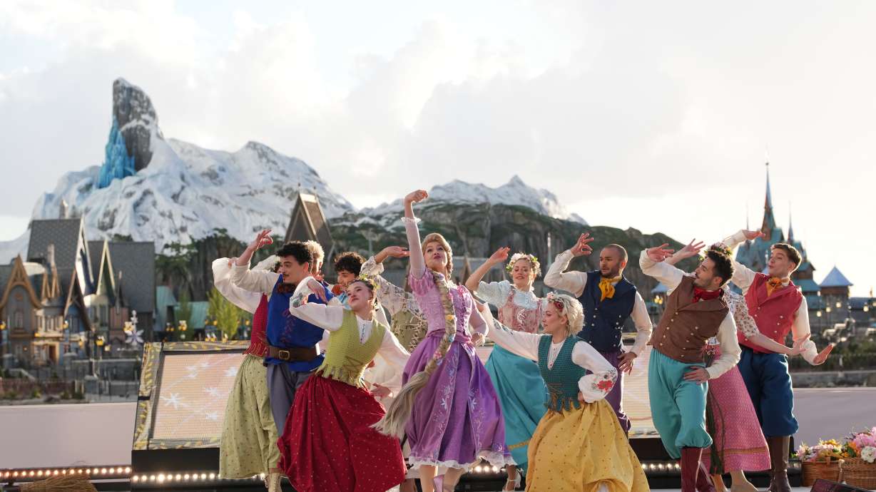 Dancers perform during the inauguration of Disney Adventure World and World Of Frozen at Disneyland Paris in Marne-la-Vallee, east of Paris, Saturday.